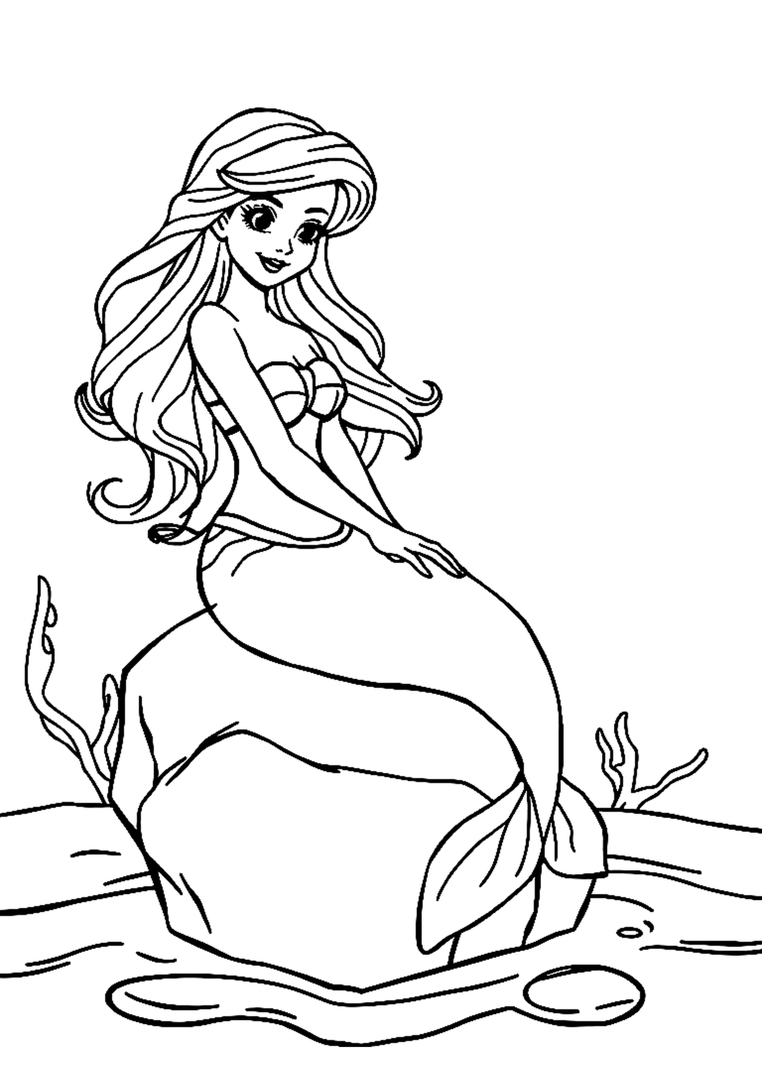 Mermaid swimming underwater with flowing hair and a sparkling tail